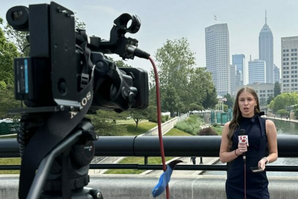 Senior Jadin Reeves films a TV news broadcast in Indianapolis