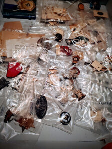Masonic pins and badges stored in plastic baggies