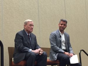 Bill Polian (left) and Mark Dominik prepare to discuss growing media coverage of the NFL prior to taking questions from IUPUI students and attendees from the Sports Management Worldwide NFL Combine Career Conference on Thursday at the JW Marriott in Indianapolis. (Photo via Frank Gogola)