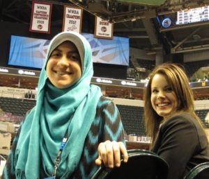 Alaa Abdeldaiem (left) and Emily Kennedy cover the Big Ten Women's Basketball Tournament at Bankers Life Fieldhouse in Indianapolis.